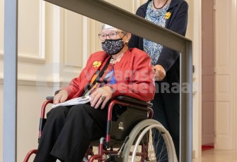 Oudere in rolstoel
